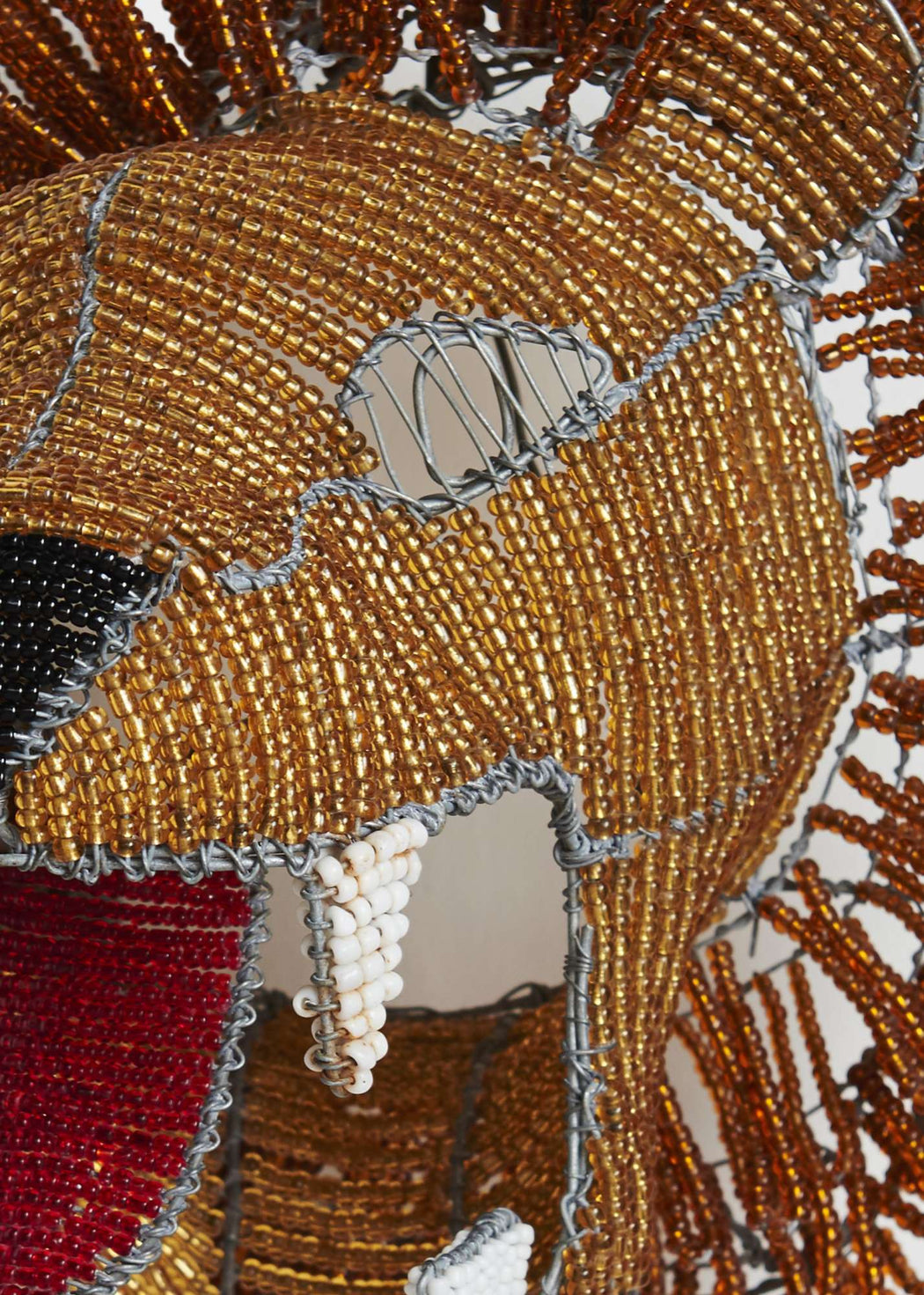 This is a shop, mask, lion, unique, interior, africa, beads, wall, handmade